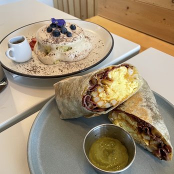 Reborn Coffee - Mocha soufflé pancake & pastrami breakfast burrito. Insane. Highly highly recommend. - Coffee & Tea Near Me - Anaheim, California Reborn Coffee - Mocha soufflé pancake & pastrami breakfast burrito. Insane. Highly highly recommend. - Coffee & Tea Near Me - Anaheim, California
