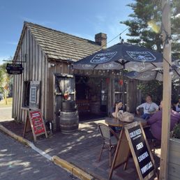 Entrance and small tables to sit