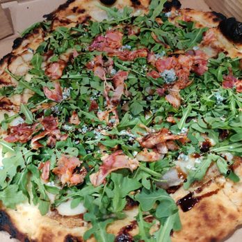 La Ruota - Pancetta Pear Arugula ($22.50) - Spicy and has gorgonzola cheese too - Pizza Near Me - Vancouver, British Columbia La Ruota - Pancetta Pear Arugula ($22.50) - Spicy and has gorgonzola cheese too - Pizza Near Me - Vancouver, British Columbia