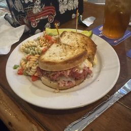 Ruben Sandwich and side of pasta salad and pickle.