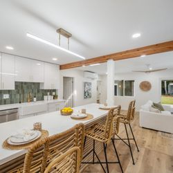Island Home Cabinets - Sleek white cabinets crafted for style, durability, and function