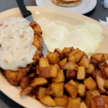Duck's Dam Diner - Chicken fried steak, home fries, and  over med egg - American Near Me - Ocklawaha, Florida