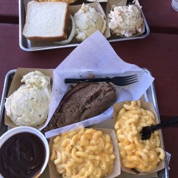Black's BBQ - 1/2 lb. Brisket Mashed potatoes with gravy on the side  Banana Pudding with Wafers Potato Salad Mac n Cheese - Barbeque Near Me - San Marcos, Texas