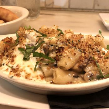 Carmelina's - Baked Mushroom Rigatoni! Lots of cheese, topped with breadcrumbs, and then BAKED. Yum! - Italian Near Me - Boston, Massachusetts Carmelina's - Baked Mushroom Rigatoni! Lots of cheese, topped with breadcrumbs, and then BAKED. Yum! - Italian Near Me - Boston, Massachusetts