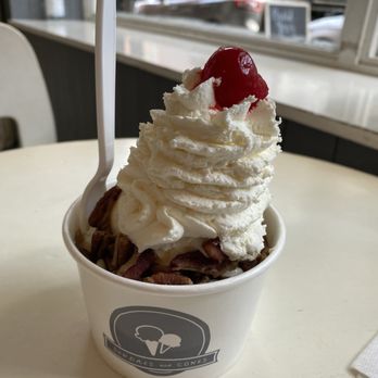 Sundaes and Cones - Sundae includes two free toppings (caramel and pecans) plus whipped cream and cherry. - Ice Cream & Frozen Yogurt Near Me - New York, New York Sundaes and Cones - Sundae includes two free toppings (caramel and pecans) plus whipped cream and cherry. - Ice Cream & Frozen Yogurt Near Me - New York, New York