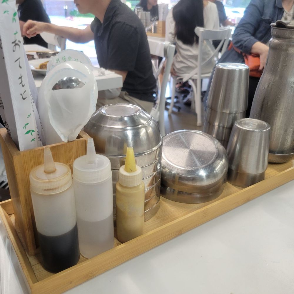 Yoo's Place - Utensil, cup/plate/bowl/water, condiment serving station on each table. - Korean Near Me - Irvine, California Yoo's Place - Utensil, cup/plate/bowl/water, condiment serving station on each table. - Korean Near Me - Irvine, California