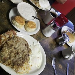 Chicken fried steak with biscuits and gravy, side of pancakes Chicken fried steak with biscuits and gravy, side of pancakes