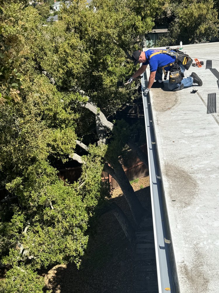 Slide of Joel's Roofing & Rain Gutter