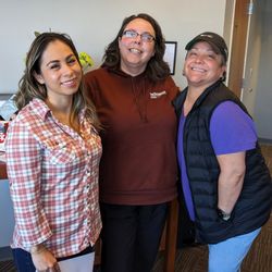 Performance Occupational Health Services - Our AHA-Certified CPR Instructors, teaching & certifying healthcare volunteers at an event.