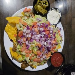 Nachos with jalapeños on the side. Very generous portion!