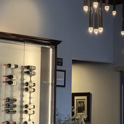 The Wild Rose - Wonderful wine and spirits display, and that hallway leads to the restrooms.