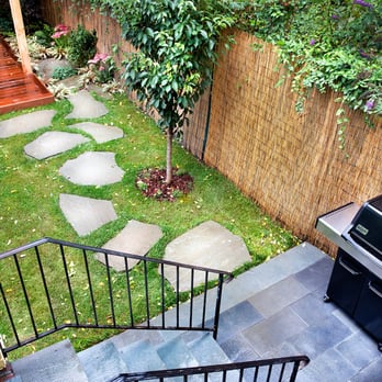 New Eco Landscapes - a backyard with a grill and steps - Landscaping Near Me - Brooklyn, New York New Eco Landscapes - a backyard with a grill and steps - Landscaping Near Me - Brooklyn, New York