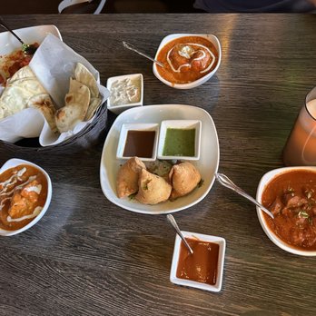 Haldi Indian Cuisine - Lunch spread of butter chicken, lamb Rogan Josh and chicken tikka. - Indian Near Me - Glendale, Arizona Haldi Indian Cuisine - Lunch spread of butter chicken, lamb Rogan Josh and chicken tikka. - Indian Near Me - Glendale, Arizona