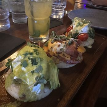 Blackstone Kitchen - Benedict flight! Must try! The sauces are outstanding!  And Passion mocktail - New American Near Me - Corona, California