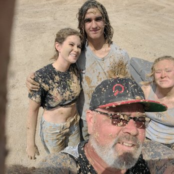 Umbrella Pest Control - Some of the crew on a much needed day off playing in the mud - Pest Control Near Me Umbrella Pest Control - Some of the crew on a much needed day off playing in the mud - Pest Control Near Me