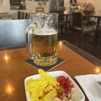 Jugem - Pickles and potato salad appetizer while curry home cooked!  So kind - Japanese Curry Near Me - Honolulu, Hawaii