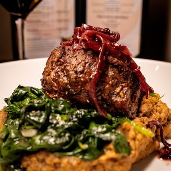 DeBlaze at 131 - a plate of food and a glass of wine - Steakhouses Near Me - Carnegie, Pennsylvania