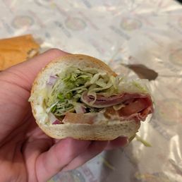 A few slices of paper thin meat folded over throughout the entire sandwich? A few slices of paper thin meat folded over throughout the entire sandwich?