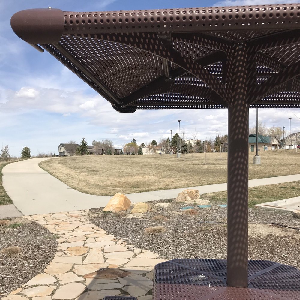 Amphitheater Park - A shaded bench... - Parks Near Me - Sandy, Utah