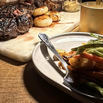 Castaway Burbank - ANGUS BEEF TOMAHAWK 48OZ and HONEY ROASTED ROOT VEGETABLES - Bars Near Me - Burbank, California Castaway Burbank - ANGUS BEEF TOMAHAWK 48OZ and HONEY ROASTED ROOT VEGETABLES - Bars Near Me - Burbank, California