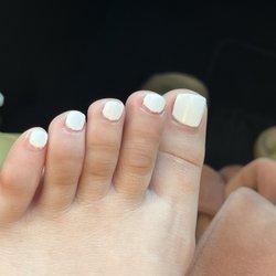 Milano Nail Spa Sugar Land - This is how they left my toes... they look out grown with no shape