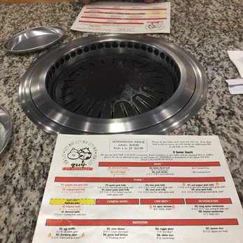 Let's Meat Kbbq - Before the carnage - clean cooking surface and menu - Korean Near Me - Charlotte, North Carolina Let's Meat Kbbq - Before the carnage - clean cooking surface and menu - Korean Near Me - Charlotte, North Carolina