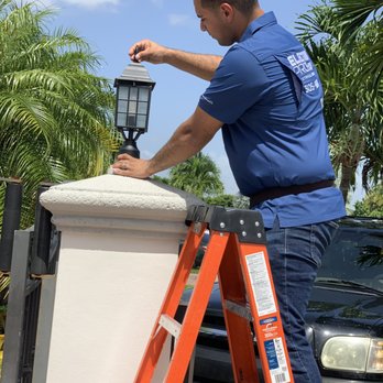 Electrik Pros Wynwood - Our Pro John Installing some exterior lighting in a local Miami home - Electricians Near Me - Miami, Florida Electrik Pros Wynwood - Our Pro John Installing some exterior lighting in a local Miami home - Electricians Near Me - Miami, Florida