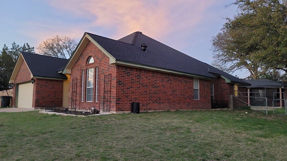 Slide of Llagua Roofing