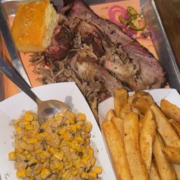 Pulled pork, brisket, coconut street corn, and fries