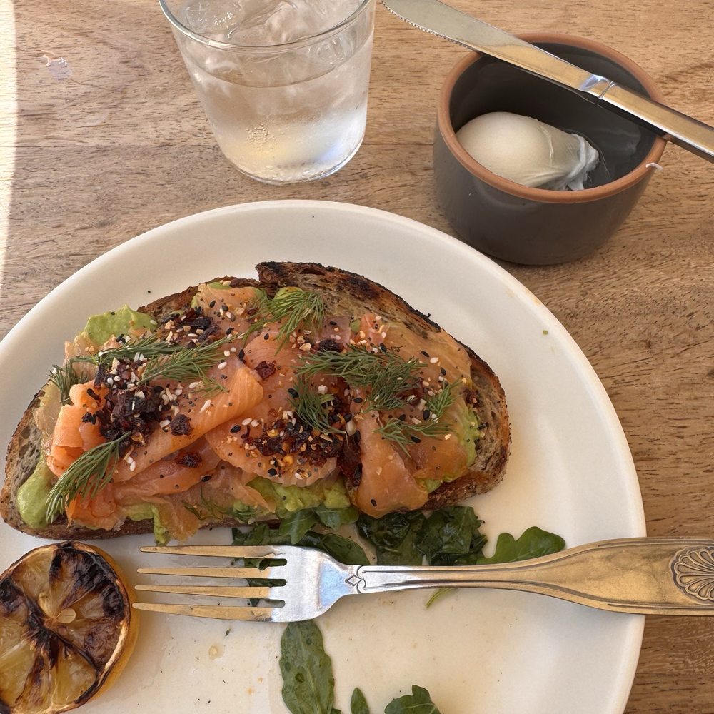 Osa Rooftop - Avocado toast + a poached egg and water. - Bars Near Me - Pasadena, California