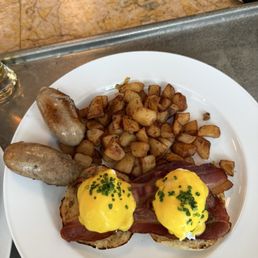 My eggs Benny with side breakfast sausages....... 11/10