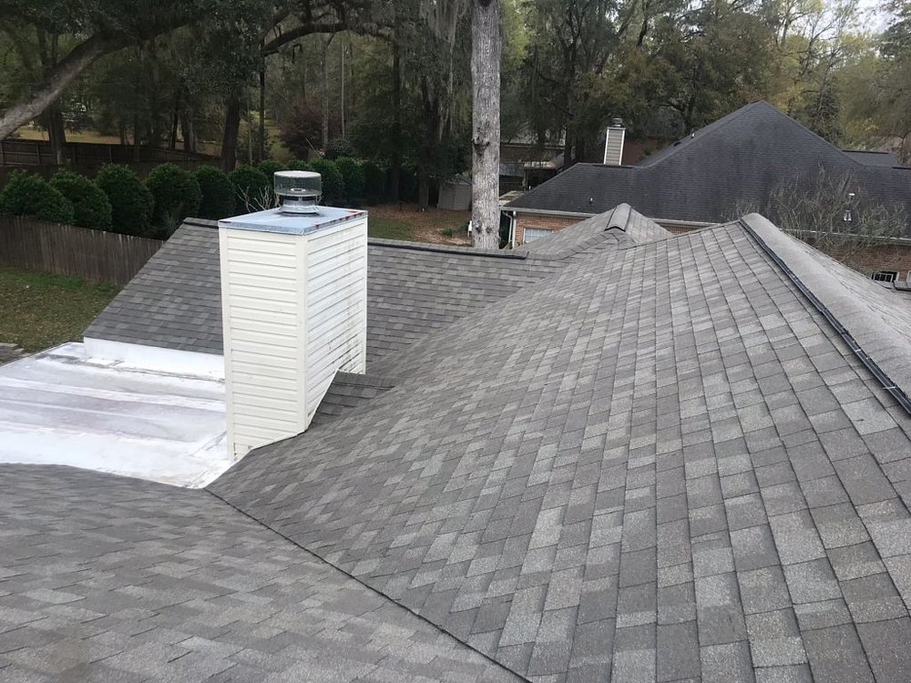 Slide of Tadlock Roofing