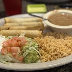 Limestone Mexican Grill & Seafood - Taquitos (chicken and beef) charro beans and Spanish rice