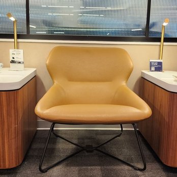 United Club - A chair in a nook... - Airport Lounges Near Me - Newark, New Jersey
