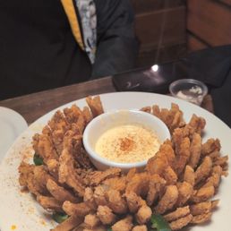 Flamin blooming onion with cheese dip Flamin blooming onion with cheese dip