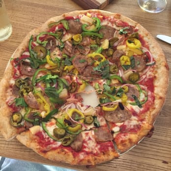 Piecasso - Custom pizza with spicy Italian sausage and lots of vegetables on whole wheat crust! Delicious! - Pizza Near Me - Stowe, Vermont Piecasso - Custom pizza with spicy Italian sausage and lots of vegetables on whole wheat crust! Delicious! - Pizza Near Me - Stowe, Vermont