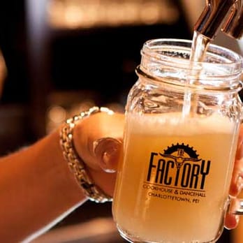 The Factory Downtown - a person pouring a drink - Bars Near Me - Charlottetown, Prince Edward Island The Factory Downtown - a person pouring a drink - Bars Near Me - Charlottetown, Prince Edward Island