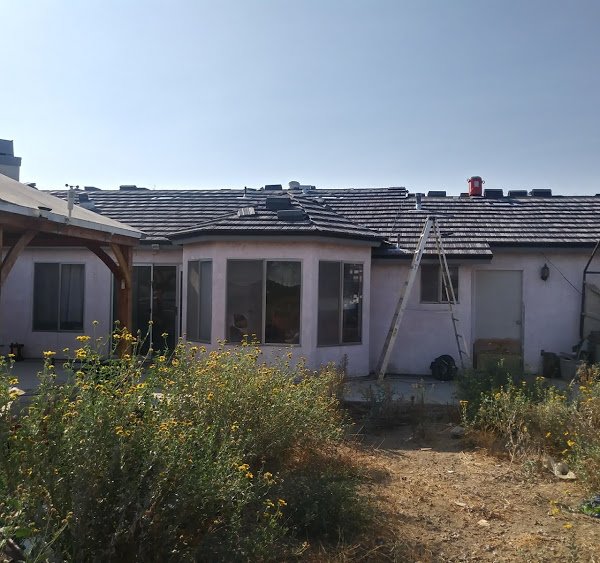 Slide of Ortiz Roofing and Construction Company