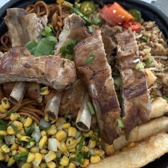 Brasa Y Chifa - 1/2 Rack Baby Back Ribs with Chaufa rice, lo mein, fried yucca, and corn salsa - Desserts Near Me - Providence, Rhode Island