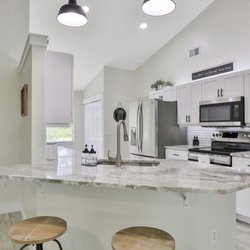 Pro Services Handyman - Kitchen Remodel. Cabinet install. Lighting fixtures. Interior painting. Plumbing fixtures. Countertop installation.