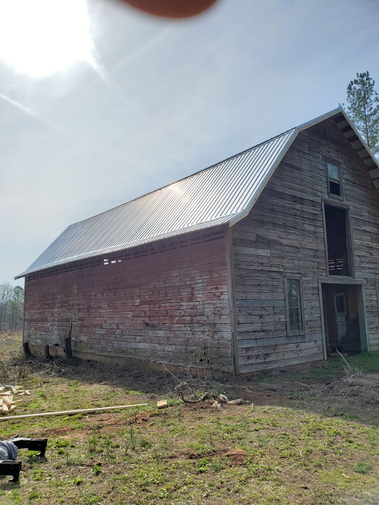 Slide of Ram's Roofing Service