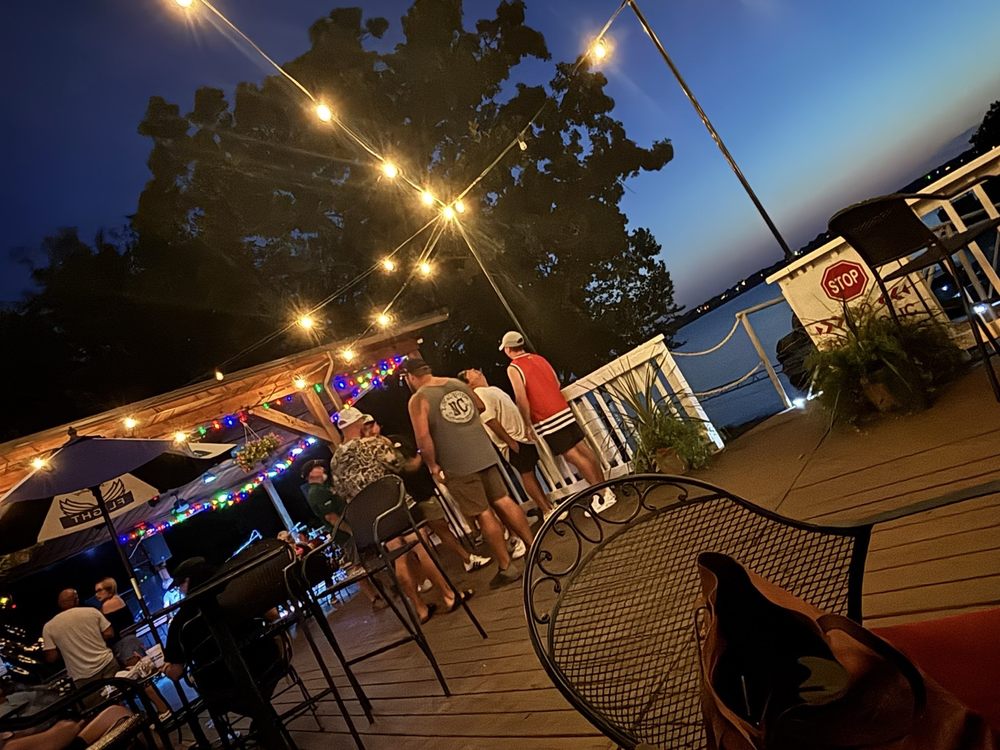 Mooney's Sunset Bar & Grill Logo