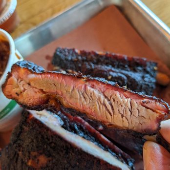 Woodpile BBQ Shack - St. Louis ribs, you can tell by the smoke ring these ribs were treated right...low and slow. - Barbeque Near Me - Clawson, Michigan Woodpile BBQ Shack - St. Louis ribs, you can tell by the smoke ring these ribs were treated right...low and slow. - Barbeque Near Me - Clawson, Michigan