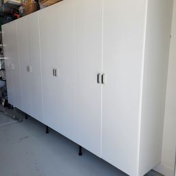 Garage cabinets, in white. Disregard the funky bright shadows in the last cabinets, it's just a reflection with my phone camera! Garage cabinets, in white. Disregard the funky bright shadows in the last cabinets, it's just a reflection with my phone camera!