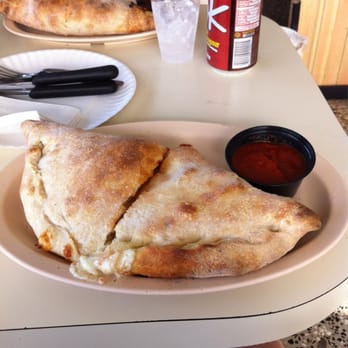 Tony's Pizza World - The small calzon! - Pizza Near Me - Arecibo, Puerto Rico Tony's Pizza World - The small calzon! - Pizza Near Me - Arecibo, Puerto Rico