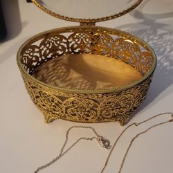 Hilton House Consign & Design - Sterling lapis lazuli necklace and 14k gold onyx necklace. Plus a brass jewerly container.