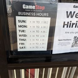 Gamestop - The sign for their hours.