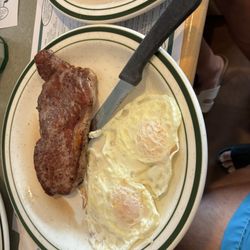 Uncle Bill's Pancake House - Steak and egg special paid extra for the waffle would not substitute the two pancakes