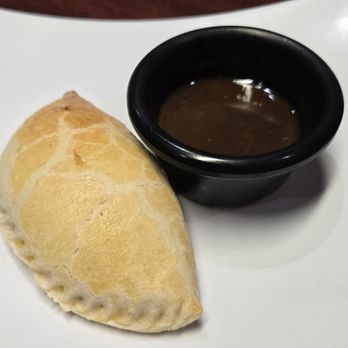 Peru Gourmet - Empanada de carne - Peruvian Near Me - Houston, Texas Peru Gourmet - Empanada de carne - Peruvian Near Me - Houston, Texas