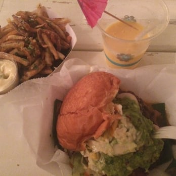 Frita Batidos - Pulled pork with tropical slaw and avocado Garlic cilantro fries Lighter batido (couldn't help while I waited for the food) - Cuban Near Me - Ann Arbor, Michigan